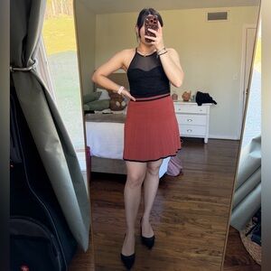 House of Harlow 1960 Rust Red Pleated Mini Skirt with Black Trim